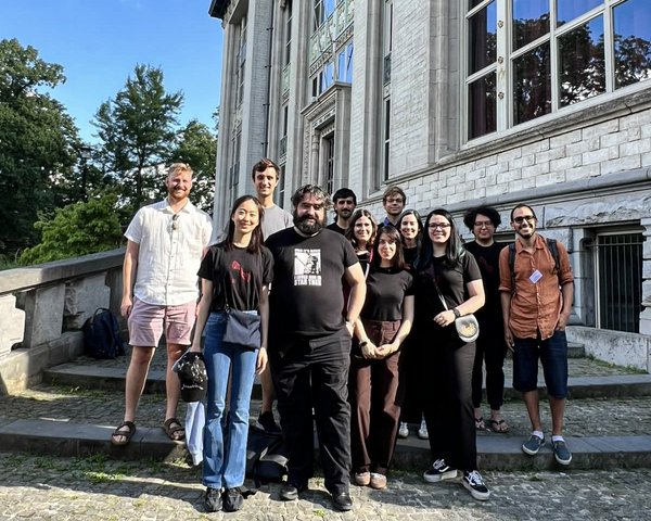 CoG members at the site of the 1927 Solvay Conference: Marta Cocco, Conor Dyson, Rico Lo, Simon Maenaut, Lorena Magaña Zertuche, Marica Minucci, Rodrigo Panosso Macedo, Ariadna Ribes Metidieri, João Santos, Brian Seymour, Maarten van de Meent, Guangzi Xu