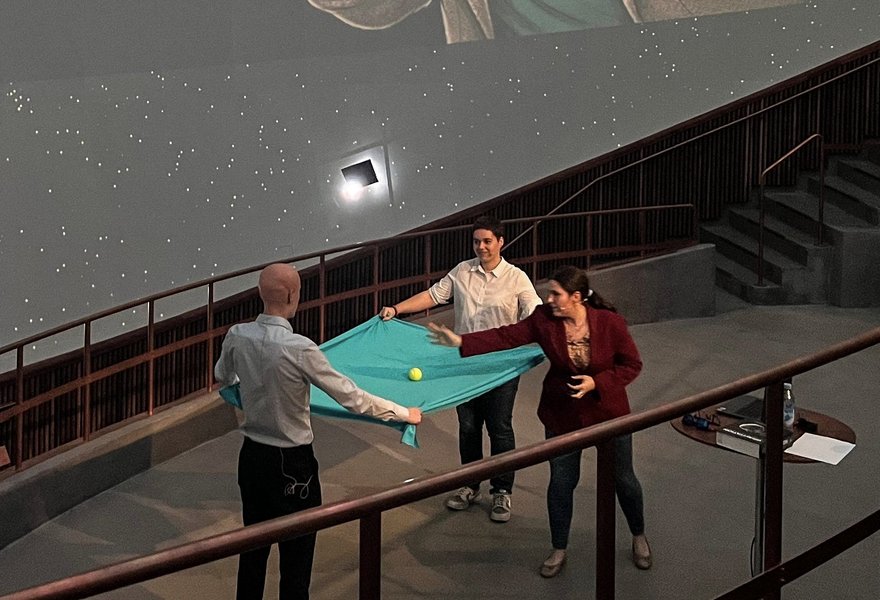 Leart Sabani, Lucía Vélez Tartajo and Ariadna Ribes Metidieri taking part in a public talk at the Tycho Brahe Planetarium in Copenhagen.